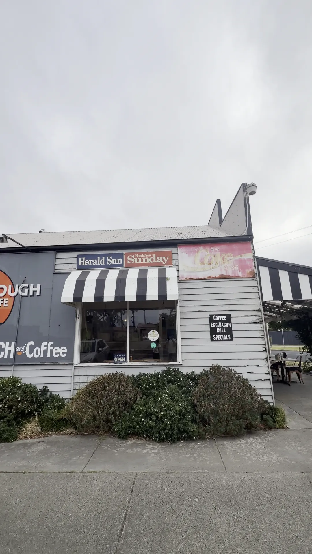 Hicksborough Store and Cafe entrance with striped awning and specials chalkboard sign